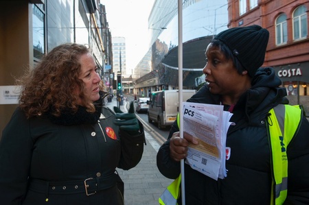 Image of PCS president Fran Heathcote talking to a female PCS member holding leaflets