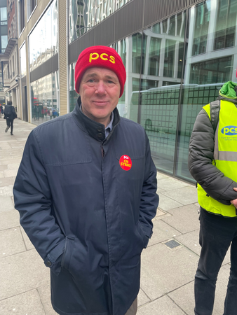 PCS General Secretary Mark Serwotka proudly wearing his PCS beanie as he visits picket lines.