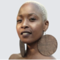 Golesedi has dark skin, very short bleached hair and large disc earrings that reach her shoulders.
